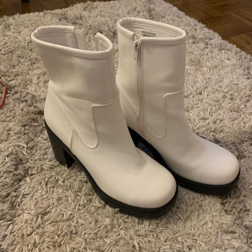 Heeled boots from Urban Outfitters. Brand new, worn once and indoors. Size 7.